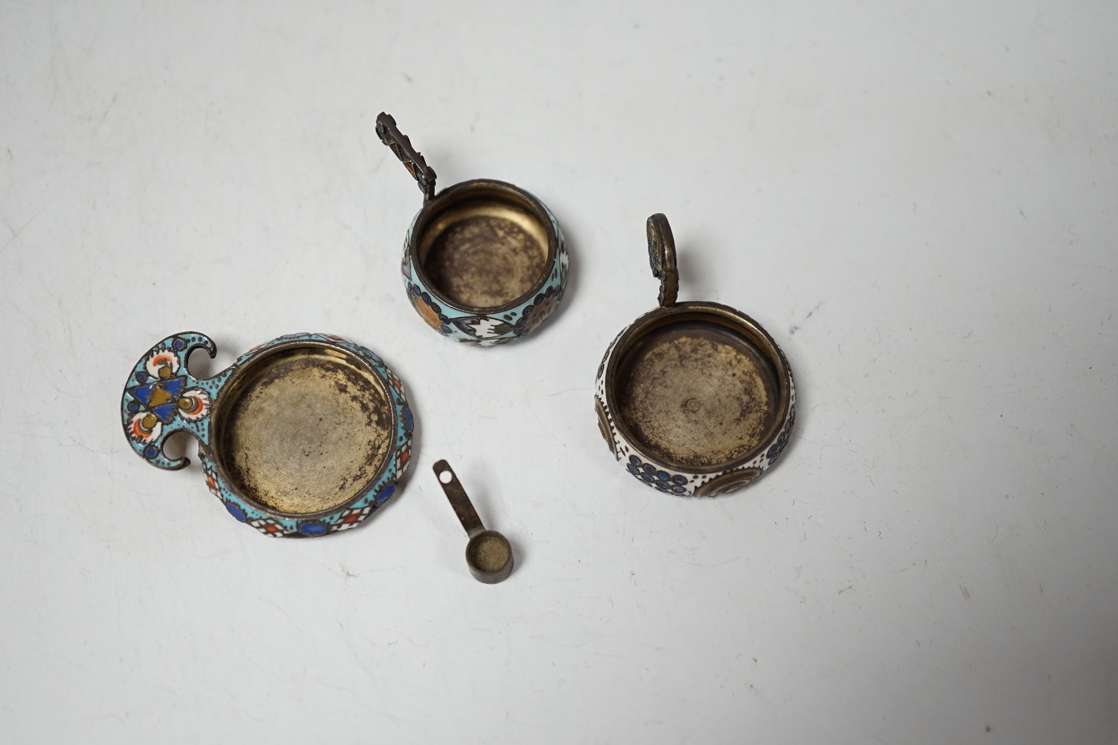Three miniature late 19th/early 20th century Russian 88 zolotnik and cloisonné enamel single handled kovsh/dish